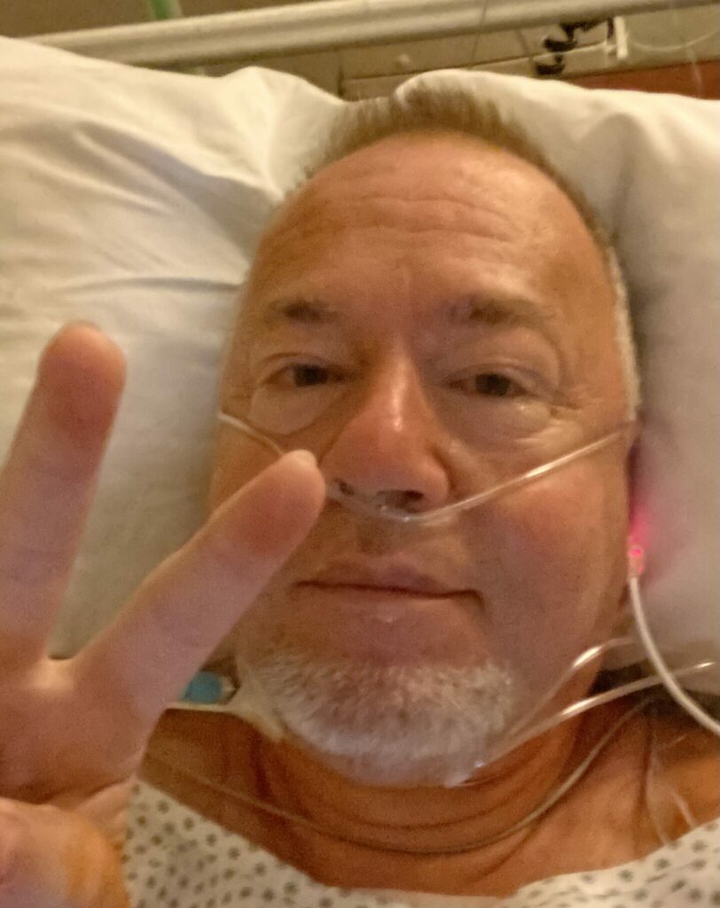 Jürgen macht V-Zeichen